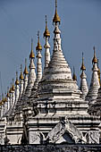 Myanmar - Mandalay, Sandamuni Pagoda. The entire ground is covered with 1749 small white pagodas with stone slabs with the Buddhist Tripitaka. 